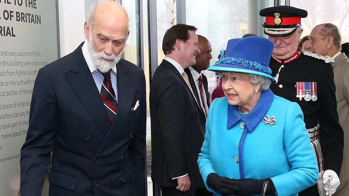  Queen Elizabeth II greets Prince Michael of Kent as she visits the National Memorial to the Few to open a new wing on March 26, 2015, in Folkestone, England. 