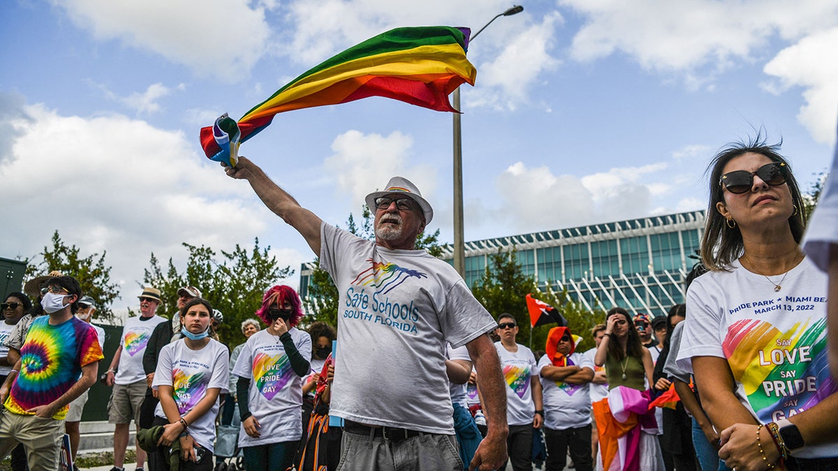 Members and supporters of the LGBTQ community attend the "Say Gay Anyway" rally in Miami Beach, Florida on March 13, 2022. - Florida's state senate on March 8 passed a controversial bill banning lessons on sexual orientation and gender identity in elementary schools, a step that critics complain will hurt the LGBTQ community. (Photo by CHANDAN KHANNA / AFP) (Photo by CHANDAN KHANNA/AFP via Getty Images)