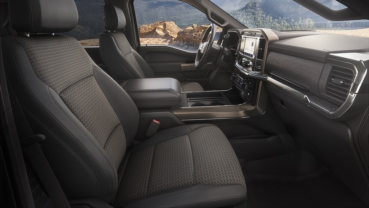 The F-150 Rattler's interior features cloth seats and bronze accents.