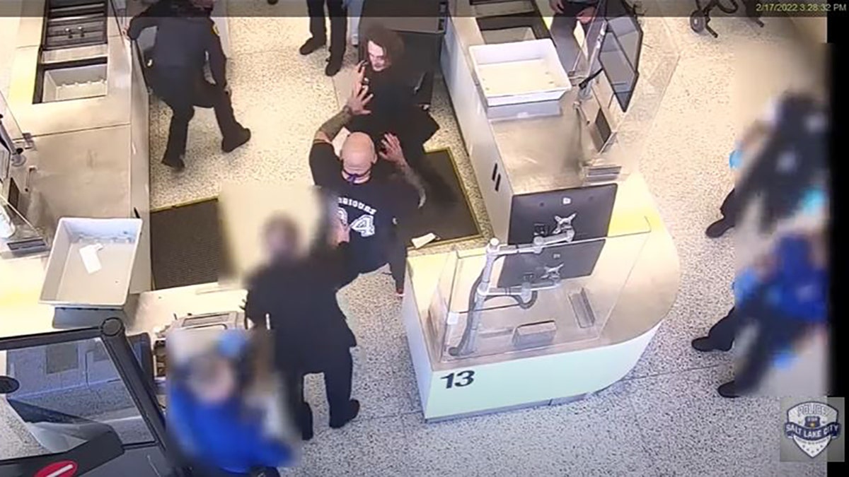 Salt Lake City police have released video showing a bystander jumping in to help an officer who was being assaulted while arresting a suspect at the city’s airport last month.
