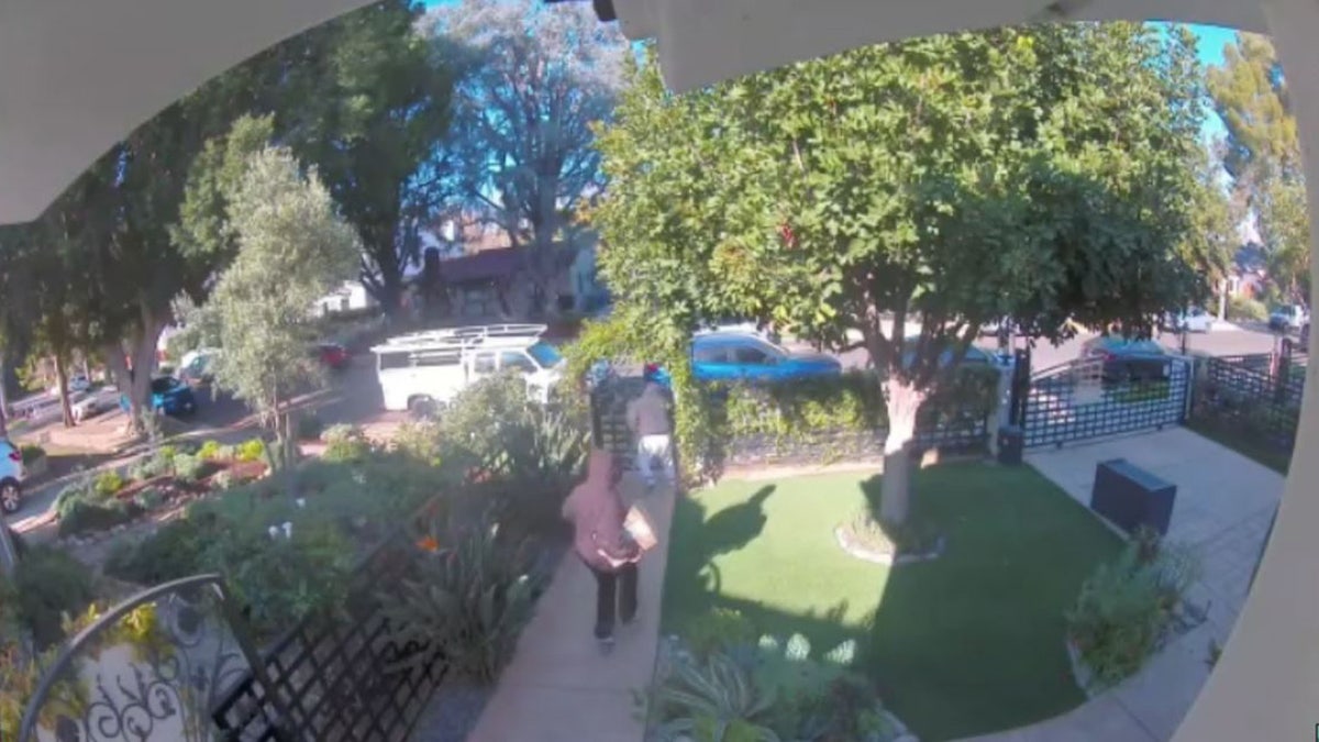 Los Angeles police are searching for two men in connection to a broad daylight armed robbery at a home in Studio City on Monday morning.