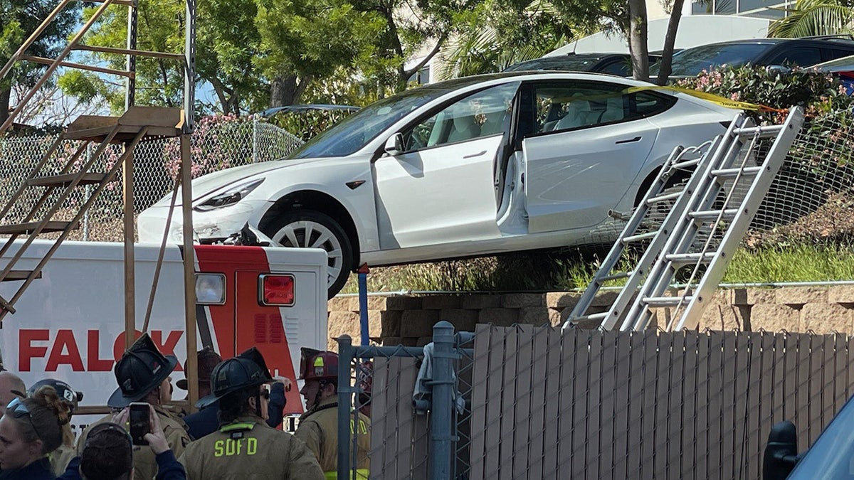 A Tesla Model 3 owner drove their car off a ledge onto an ambulance in San Diego.