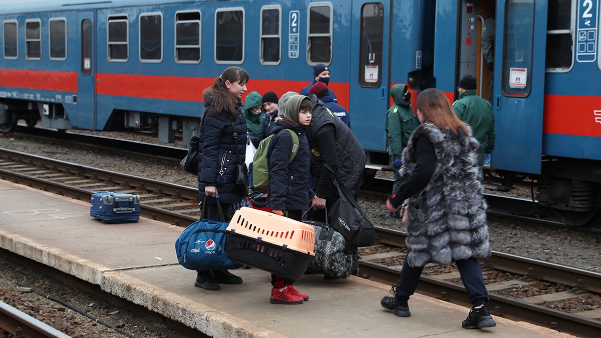 Ukrainian refugees fleeing