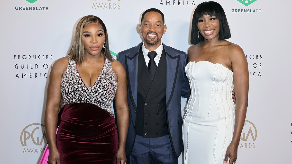 (L-R) Serena Williams, Will Smith and Venus Williams attend the 33rd Annual Producers Guild Awards on March 19.