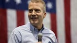 Sen. Dan Sullivan addresses the crowd during a campaign rally at a PenAir airplane hangar on Nov. 3, 2014, in Anchorage, Alaska.