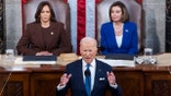 President Joe Biden delivers his first State of the Union address to a joint session of Congress at the Capitol, Tuesday, March 1, 2022, in Washington as Vice President Kamala Harris and House speaker Nancy Pelosi of Calif., look on. (Jim Lo Scalzo/Pool via AP)