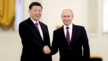 Russian President Vladimir Putin shakes hands with his Chinese counterpart Xi Jinping at the Kremlin in Moscow, Russia, June 5, 2019. REUTERS/Evgenia Novozhenina/Pool