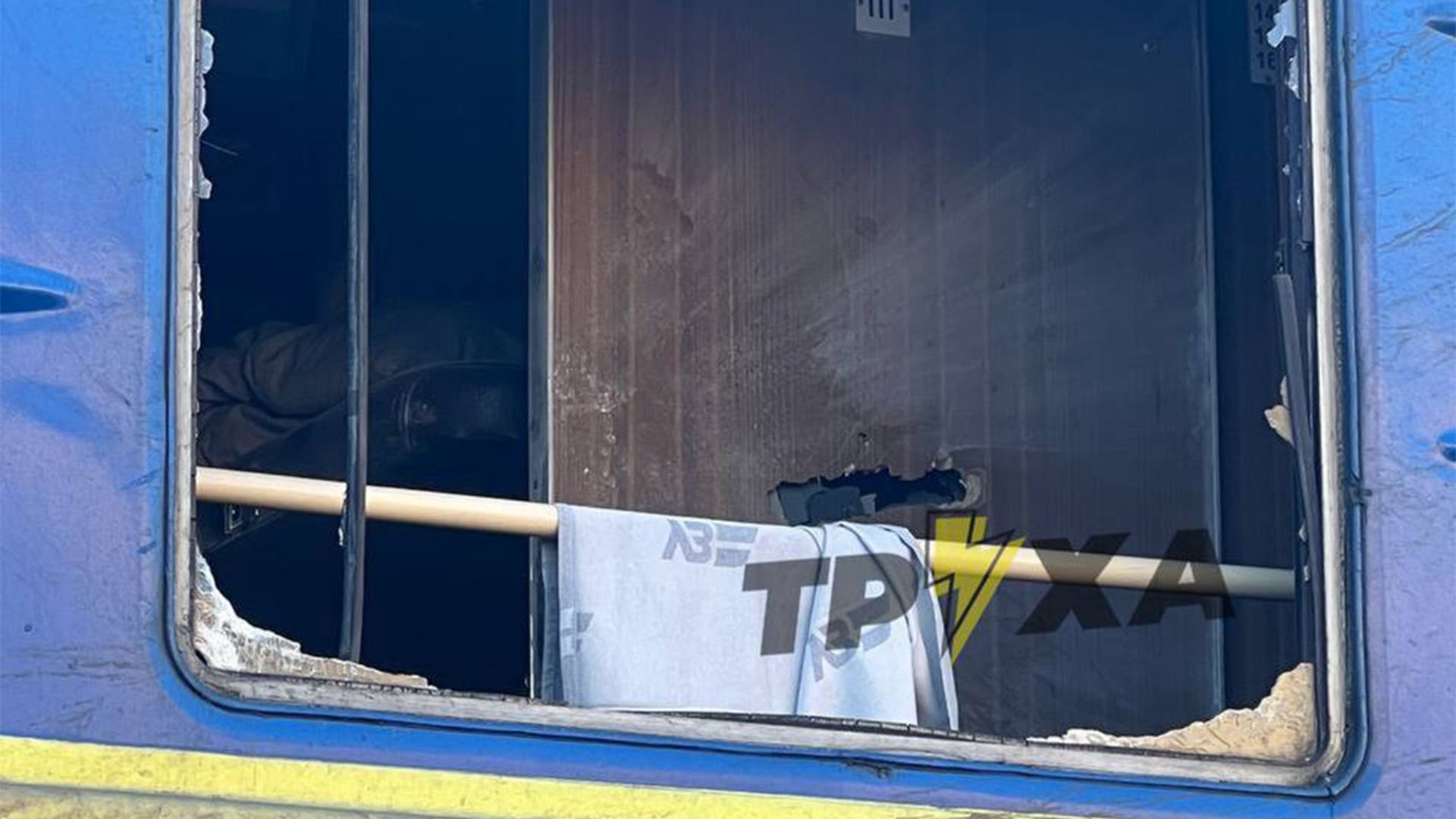 Train evacuating refugees, including 100 children, hit by Russian shelling, Ukrainian railroad says.