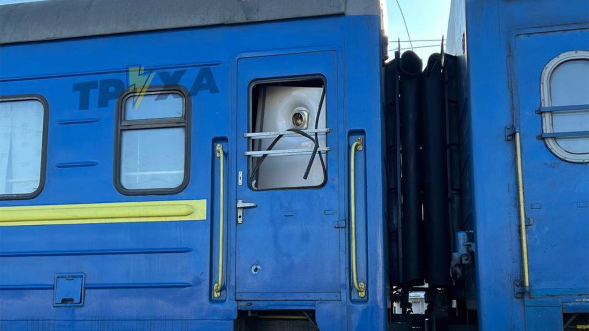 Train evacuating refugees, including 100 children, hit by Russian shelling, Ukrainian railroad says.