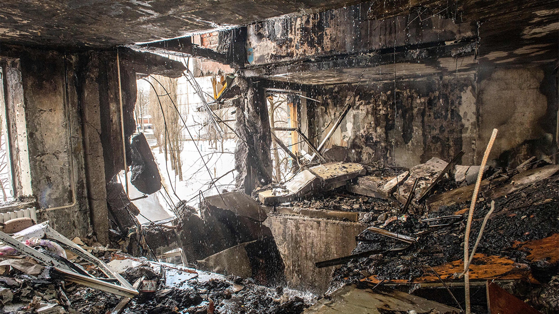 This picture shows an apartment destroyed after shelling the day before in Ukraine's second-biggest city of Kharkiv on March 8, 2022.