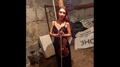 Ukraine's 'cellar violinist' plays on as she shelters from bombs