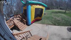 NC mom's terrifying video shows bounce house picked up by wind, nearly smashing into child