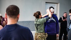 US special ops veterans, medical professionals training Ukrainian soldiers, civilians in combat care