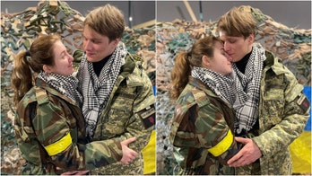 Optimism in Kyiv: Ukrainian newlyweds say they will fight until the 'last drop of blood'