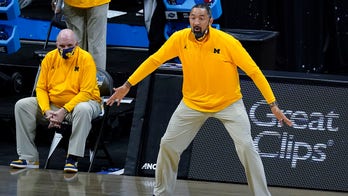 Michigan's Juwan Howard contrite about swipe at Wisconsin