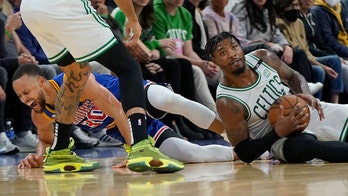 Steph Curry injures left foot in Warriors blowout loss to Celtics