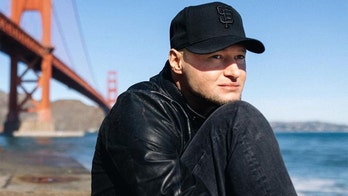 Ukrainian musician joins military as he stays and fights amid Russian invasion: 'Not time for playing guitars'