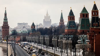 Russian spy charged with working for Moscow to sow discord in US, Justice Department says