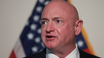 Sen. Mark Kelly says he backs Roe v. Wade but can't name abortion limits he supports, even up until birth