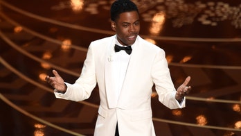 Oscars producer says Chris Rock didn't tell his planned jokes before Will Smith's slap: 'He was freestyling'