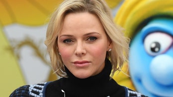 Princess Charlene of Monaco returns home to Prince Albert and their two children following medical saga