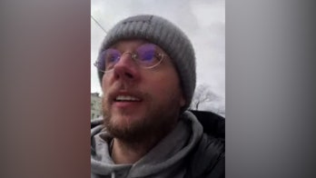 Ukrainian delivers food, medicine in Kyiv, says city is 'not afraid,' 'ready to fight'