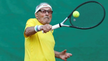 World's oldest tennis player chooses to stay in Ukraine as Russia invades