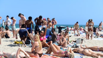 Fort Lauderdale spring breakers having fun in the sun as Miami Beach guests simmer over curfew