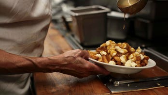 French restaurant claims it was threatened by patrons who thought poutine was named after Putin