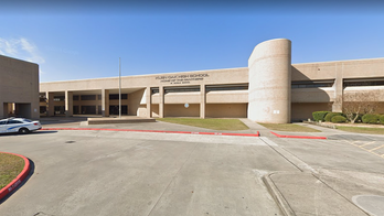 Texas student alleging harassment over sitting during pledge gets $90K: 'Communists'