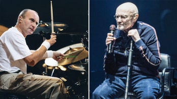 Phil Collins remains seated during Berlin concert months after revealing he can no longer play the drums