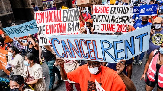 NYC landlord publicly calls out tenants for not paying rent with massive banners