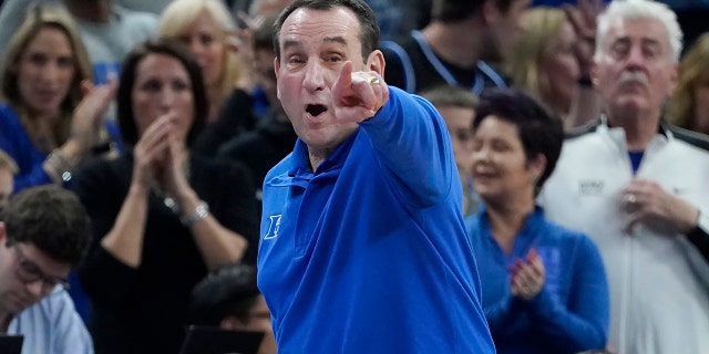 Duke head coach Mike Krzyzewski gestures toward players during the second half of his team's college basketball game against Texas Tech in the Sweet 16 round of the NCAA tournament in San Francisco, Thursday, March 24, 2022.