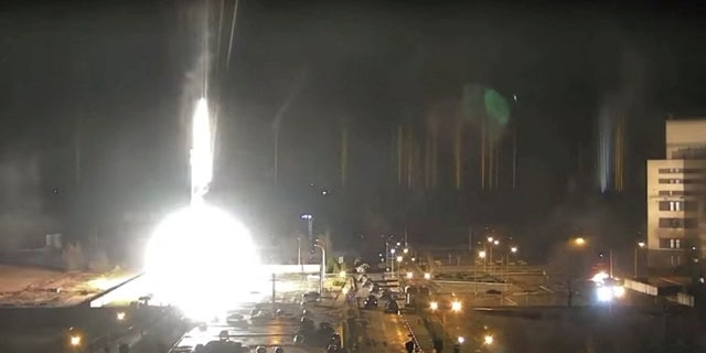 Surveillance camera footage shows a flare landing at the Zaporizhzhia nuclear power plant during shelling in Enerhodar, Zaporizhia Oblast, Ukraine March 4, 2022, in this screengrab from a video obtained from social media. Zaporizhzhya NPP via YouTube/via REUTERS