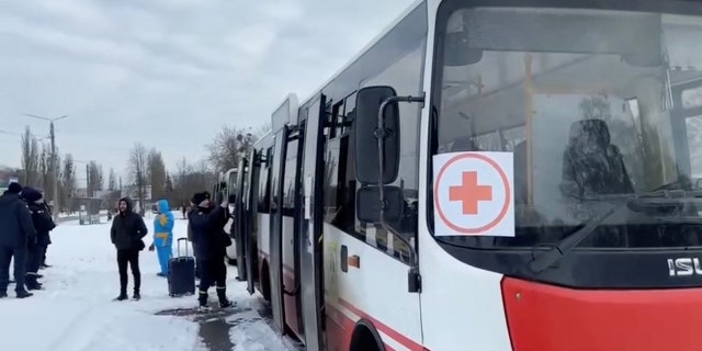 Buses wait during evacuations amid the Russian invasion of Ukraine, out of Sumy, March 8, 2022.