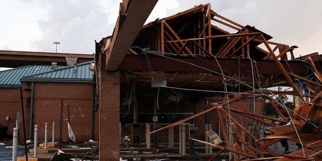 A view of a damaged building after a tornado in a widespread storm system touched down in Round Rock, Texas, U.S., March 21, 2022.