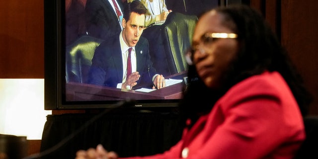 Judge Ketanji Brown Jackson listens to questions from Sen. Josh Hawley, R-Mo., seen on video display, as she testifies during a Senate Judiciary Committee confirmation hearing on Capitol Hill on March 22, 2022.