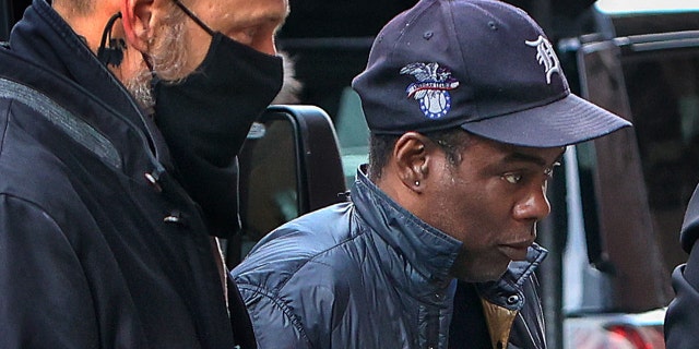 Actor/comedian Chris Rock enters the Wilbur Theater in Boston for the first of his two sold-out performances on March 30, 2022. Three days earlier, Rock was slapped by Will Smith at the Academy Awards.