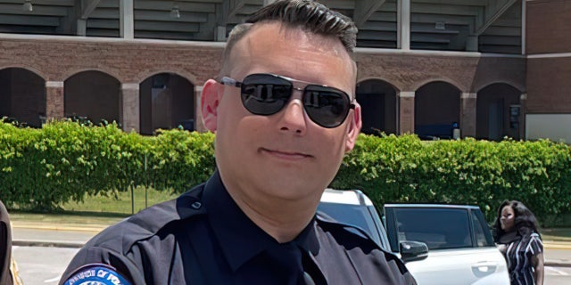 Ogilvie was killed in a shootout with the suspect, who also died in the gunfire, investigators said.