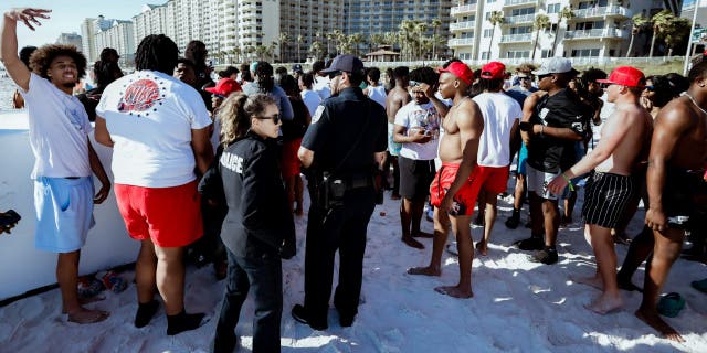 Police break up spring break crowd at Panama City Beach.
