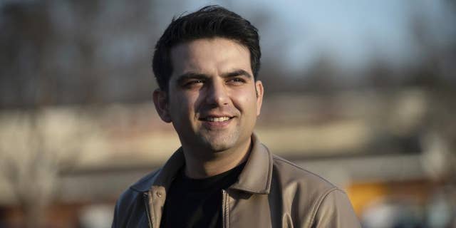 Afghan refugee Ahmad Saeed Totakhail poses for a photo in Dale City, Va., Wednesday, Feb. 16, 2022.