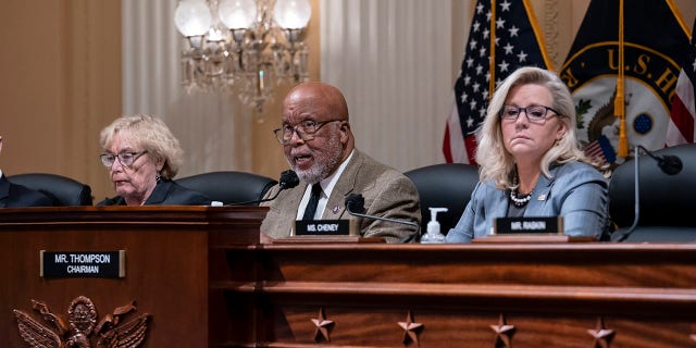 Chairman Bennie Thompson, D-Miss., center, flanked by Rep. Zoe Lofgren, D-Calif., left, and Vice Chair Liz Cheney, R-Wyo., makes a statement as the House committee investigating the Jan. 6 attack on the U.S. Capitol pushes ahead with contempt charges against former advisers to Donald Trump, Peter Navarro and Dan Scavino, in response to their refusal to comply with subpoenas, at the Capitol in Washington, Monday, March 28, 2022. 