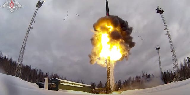 This photo taken from video provided by the Russian Defense Ministry Press Service on Saturday, Feb. 19, 2022, shows a Yars intercontinental ballistic missile being launched from an air field during military drills. The Russian military on Friday announced massive drills of its strategic nuclear forces.