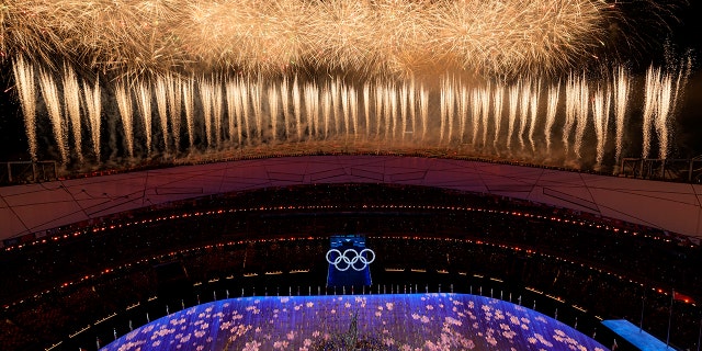Fireworks light up the sky over Olympic Stadium during the closing ceremony of the 2022 Winter Olympics, Sunday, Feb. 20, 2022, in Beijing.