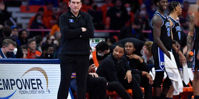 Duke coach Mike Krzyzewski watches from the sideline during the second half of the team's NCAA college basketball game against Syracuse in Syracuse, N.Y., Saturday, Feb. 26, 2022. Duke won 97-72.
