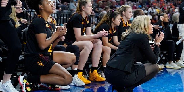 Arizona State head coach Charli Turner Thorne, right, reacts with her team during the second half of an NCAA college basketball game against the Oregon State in the first round of the Pac-12 women's tournament Wednesday, March 2, 2022, in Las Vegas.