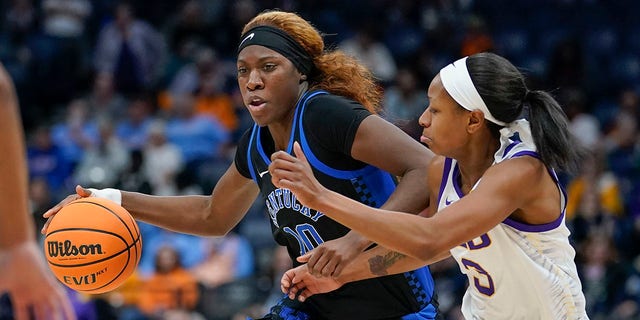 Kentucky's Rhyne Howard (10) is guarded by LSU's Khayla Pointer (3) in the second half of an NCAA college basketball game at the women's Southeastern Conference tournament Friday, March 4, 2022, in Nashville, Tenn.