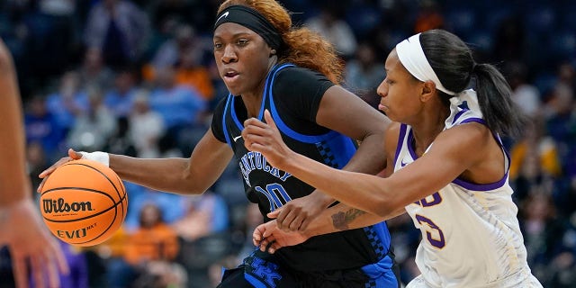 Kentucky's Rhyne Howard (10) is guarded by LSU's Khayla Pointer (3) in the second half of an NCAA college basketball game at the women's Southeastern Conference tournament Friday, March 4, 2022, in Nashville, Tenn.