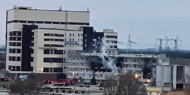 In this handout photo provided by the Ukrainian National Nuclear Energy Generation Company Energoatom, a fire is seen at the Zaporizhzhia nuclear plant - the largest in Europe - after it was attracted by Russian forces early on Friday morning Energodar, Ukraine, March 4, 2022.Â