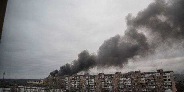 Smoke rises after shelling by Russian forces in Mariupol, Ukraine, Friday, March 4, 2022.(AP Photo/Evgeniy Maloletka)